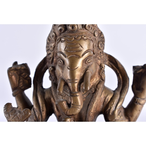 630 - AN ANTIQUE INDIAN BRONZE FIGURE OF GANESHA. 14 cm x 8 cm.