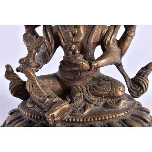 630 - AN ANTIQUE INDIAN BRONZE FIGURE OF GANESHA. 14 cm x 8 cm.