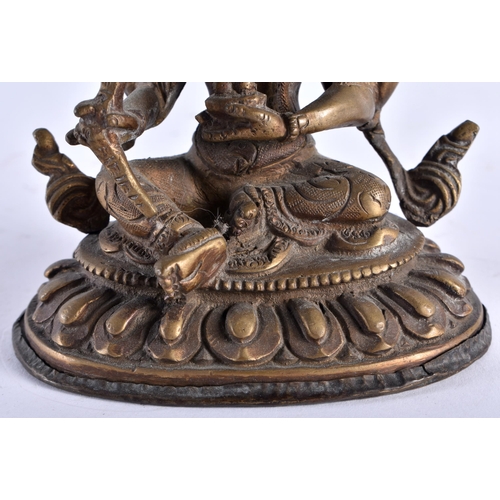 630 - AN ANTIQUE INDIAN BRONZE FIGURE OF GANESHA. 14 cm x 8 cm.