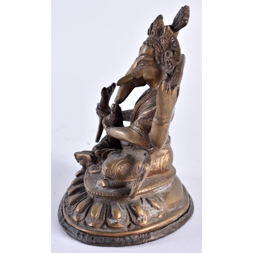 630 - AN ANTIQUE INDIAN BRONZE FIGURE OF GANESHA. 14 cm x 8 cm.