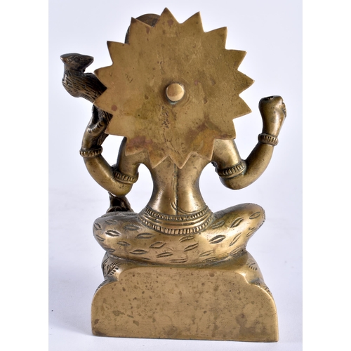 653 - A 19TH CENTURY MIDDLE EASTERN INDIAN BRONZE FIGURE OF A DEITY modelled with multiple arms. 16 cm x 8... 