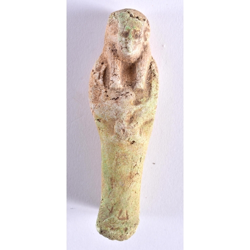 664 - AN ANCIENT EGYPTIAN SHABTI FIGURE together with a stone carving of a long necked bird. Largest 14 cm... 