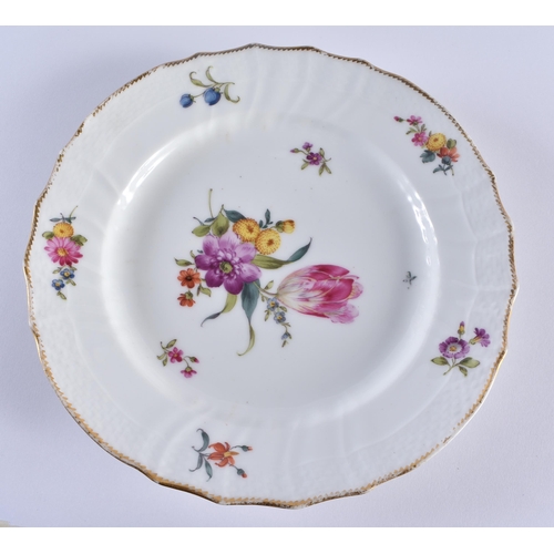 667 - A SET OF TEN DANISH ROYAL COPENHAGEN PORCELAIN SCALLOPED DISHES painted with flowers. 21 cm wide. (1... 