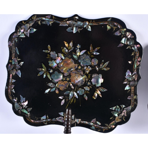 695 - A PAIR OF ANTIQUE COUNTRY HOUSE BLACK LACQUERED MOTHER OF PEARL FANS decorated with foliage. 38 cm x... 