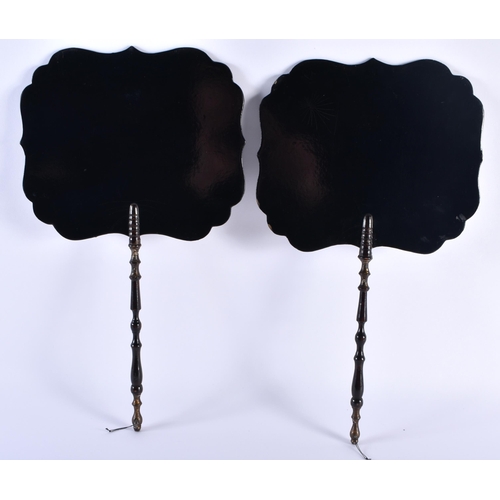 695 - A PAIR OF ANTIQUE COUNTRY HOUSE BLACK LACQUERED MOTHER OF PEARL FANS decorated with foliage. 38 cm x... 