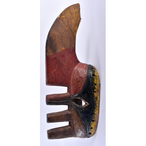 697 - AN AFRICAN PAINTED WOOD TRIBAL NIGERIAN IGALA MASK. 36 cm x 8 cm.