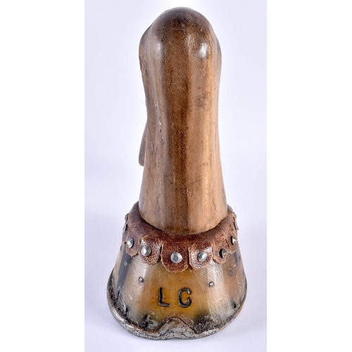 698 - AN UNUSUAL ANTIQUE EQUESTRIAN COUNTRY HOUSE WOOD AND HORN HORSE HOOF DOOR STOP. 27 cm x 18 cm.