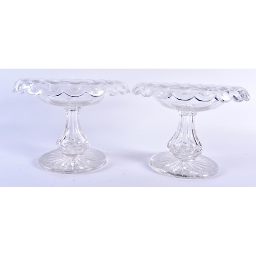 703 - A PAIR OF ANTIQUE CUT GLASS PEDESTAL COMPORTS. 19 cm x 14 cm.