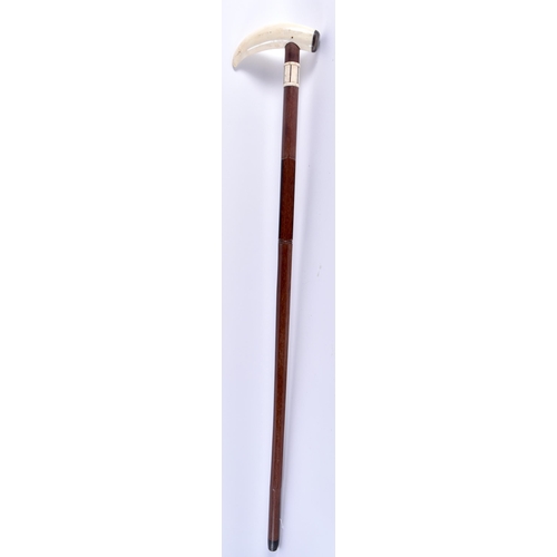 708 - AN ANTIQUE WHALEBONE MARITIME WALKING CANE. 80 cm long.