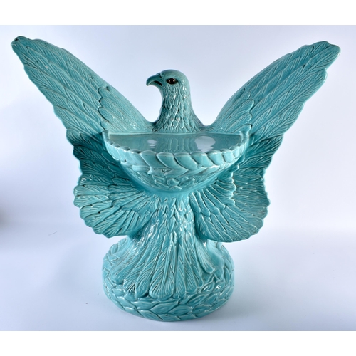 715 - A RARE ANTIQUE CONTINENTAL BLUE GLAZED MAJOLICA EAGLE PEDESTAL PLANTER ON STAND. 58 cm x 52 cm.