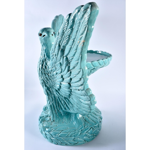 715 - A RARE ANTIQUE CONTINENTAL BLUE GLAZED MAJOLICA EAGLE PEDESTAL PLANTER ON STAND. 58 cm x 52 cm.