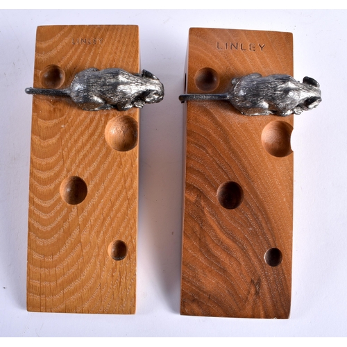 726 - A PAIR OF DAVID LINLEY CARVED WOOD CHEESE BLOCK DOOR STOPS. 17 cm x 6 cm.