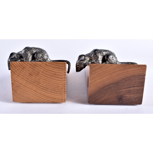 726 - A PAIR OF DAVID LINLEY CARVED WOOD CHEESE BLOCK DOOR STOPS. 17 cm x 6 cm.