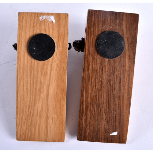 726 - A PAIR OF DAVID LINLEY CARVED WOOD CHEESE BLOCK DOOR STOPS. 17 cm x 6 cm.