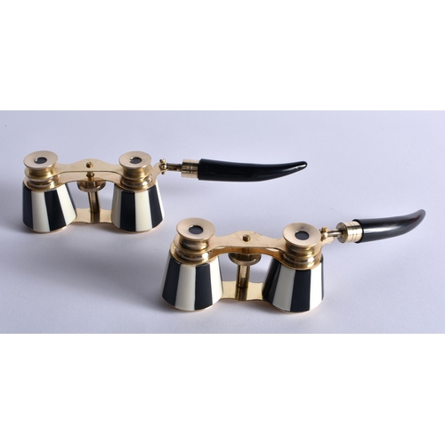 737 - TWO PAIRS OF HORN HANDLED OPERA GLASSES. 20 cm x 8 cm extended. (2)