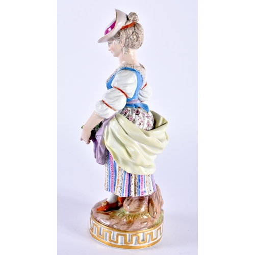 743 - AN ANTIQUE GERMAN MEISSEN PORCELAIN FIGURE OF A FEMALE modelled holding baskets of flowers. 18 cm hi... 