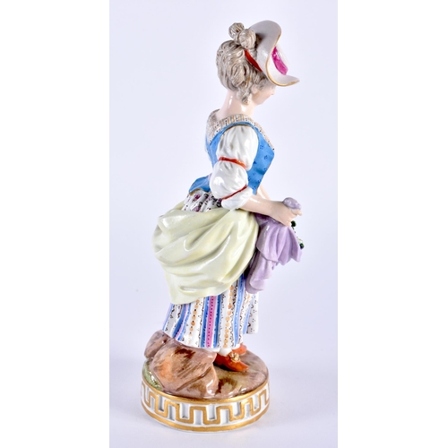 743 - AN ANTIQUE GERMAN MEISSEN PORCELAIN FIGURE OF A FEMALE modelled holding baskets of flowers. 18 cm hi... 