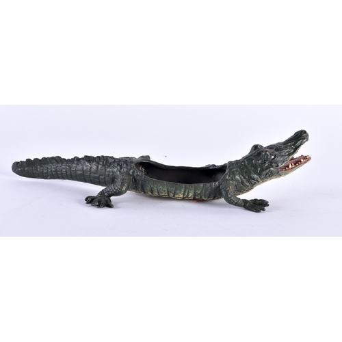 752 - A COLD PAINTED BRONZE CROCODILE. 21 cm long.