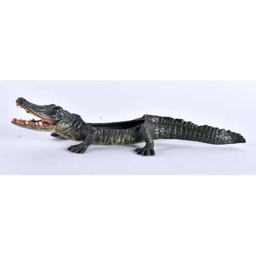 752 - A COLD PAINTED BRONZE CROCODILE. 21 cm long.