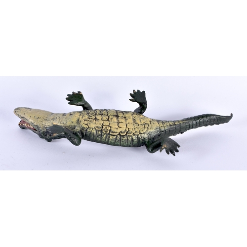 752 - A COLD PAINTED BRONZE CROCODILE. 21 cm long.