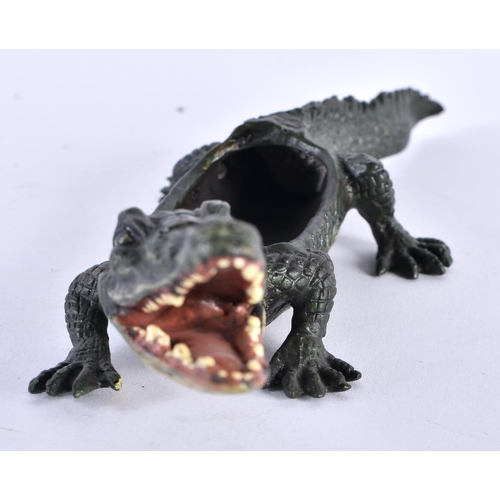 752 - A COLD PAINTED BRONZE CROCODILE. 21 cm long.