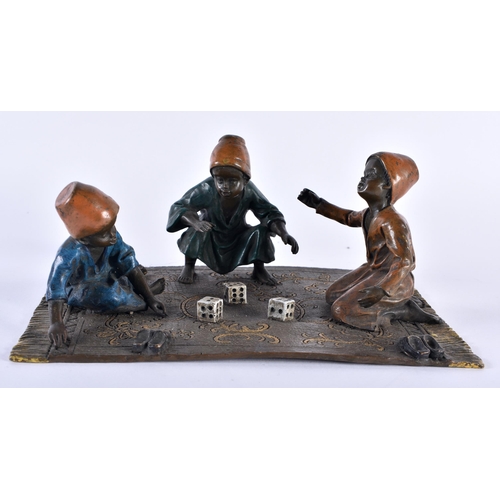 753 - A COLD PAINTED BRONZE GROUP OF DICE PLAYERS. 18 cm x 12 cm.