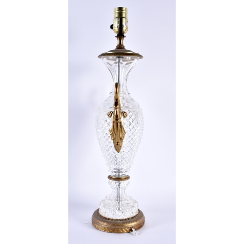 758 - A LARGE CUT GLASS TWIN HANDLED SWAN NECK COUNTRY HOUSE LAMP. 50 cm high.