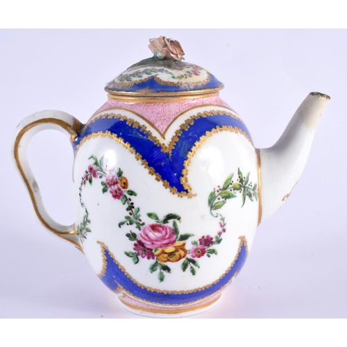 76 - AN 18TH CENTURY SEVRES PORCELAIN TEAPOT AND COVER painted with floral sprays. 12 cm wide.