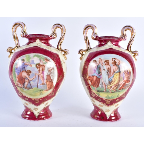 767 - A PAIR OF AUSTRIAN VIENNA STYLE TWIN HANDLED VASES. 20 cm x 10 cm.