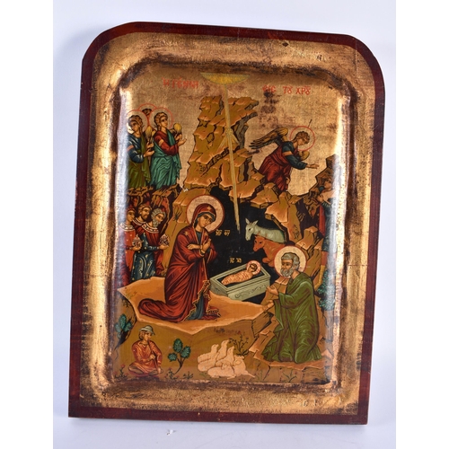 769 - A RUSSIAN CARVED WOOD PAINTED ICON. 42 cm x 30 cm.