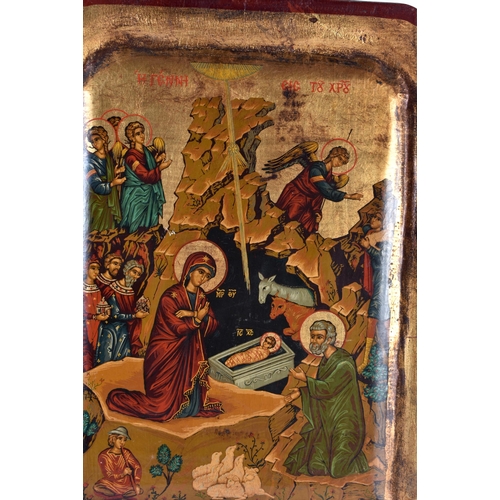 769 - A RUSSIAN CARVED WOOD PAINTED ICON. 42 cm x 30 cm.