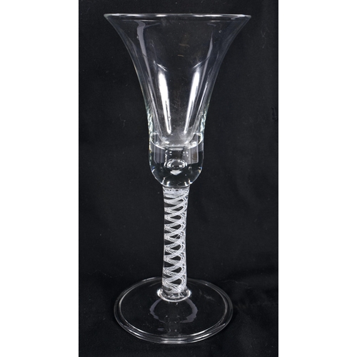 770 - FOUR ANIQUE WINE GLASSES three with spiral twists. Largest 22.5 cm high. (4)