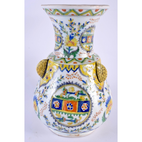 86 - A MIDDLE EASTERN TURKISH FAENCE KUTAHYA MOSQUE VASE. 21 cm x 11 cm.