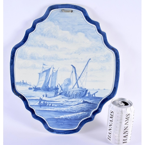 91 - A LARGE DUTCH DELFT POTTERY BLUE AND WHITE PLAQUE painted with boating scenes. 36 cm x 28 cm.