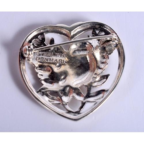 1752 - A Silver Heart Brooch with a Bird in the Centre.  Stamped Sterling.  3.2cm x 3.2cm, weight 9.2g