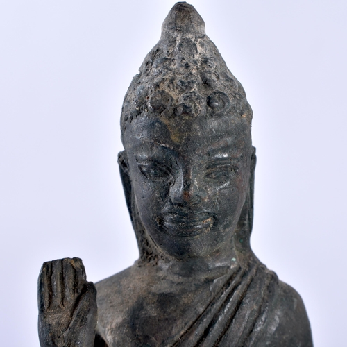 THREE 19TH CENTURY SOUTHEAST ASIAN BRONZE BUDDHA modelled in various ...