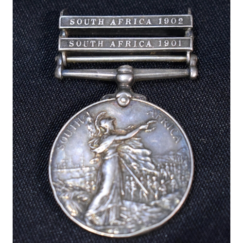 3083 - A South African Campaign medal 1901/2 together Canadian 53 overseas Battalion badges (7).