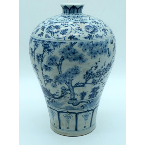 A Chinese porcelain blue and white Mei pin vase decorated with foliage ...