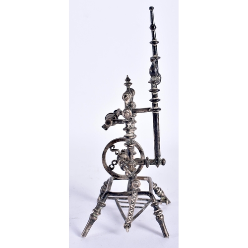 102 - AN UNUSUAL 19TH CENTURY CONTINENTAL SILVER SPINNING WHEEL with moving features and spinning central ... 