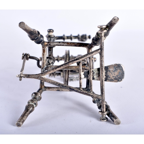 102 - AN UNUSUAL 19TH CENTURY CONTINENTAL SILVER SPINNING WHEEL with moving features and spinning central ... 