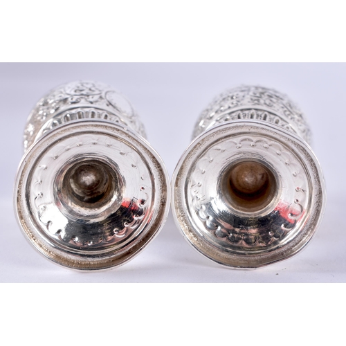 106 - A Pair of Victorian Silver Condiments.  Hallmarked London 1886.  9.5cm x 4cm, total weight 105.2g (2... 