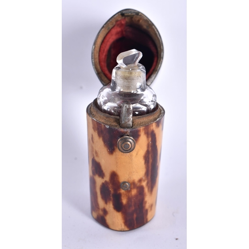 111 - A RARE REGENCY CARVED TORTOISESHELL CASED GLASS SCENT BOTTLE with engraved silver mounts. 6.5 cm x 3... 