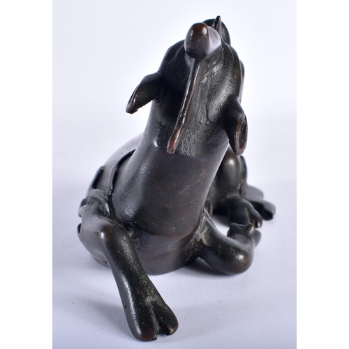 120 - A 16TH/17TH CENTURY CHINESE BRONZE FIGURE OF A STYLISED BEAST Ming/Qing, modelled as a stylised anim... 