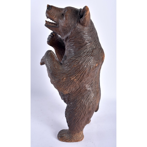 131 - A LARGE 19TH CENTURY BAVARIAN BLACK FOREST CARVED WOOD FIGURE OF A BEAR modelled with hands raised a... 