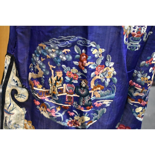 144 - A FINE 19TH CENTURY CHINESE SILK EMBROIDERED ROBE Qing, decorated all over with flowers and assorted... 