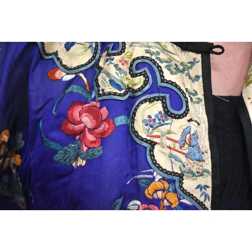 144 - A FINE 19TH CENTURY CHINESE SILK EMBROIDERED ROBE Qing, decorated all over with flowers and assorted... 