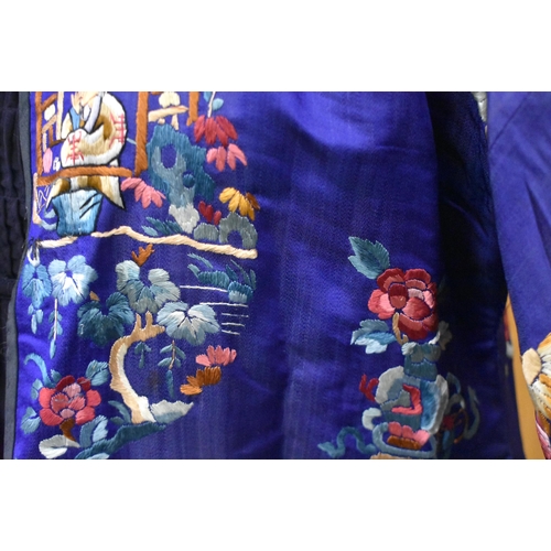 144 - A FINE 19TH CENTURY CHINESE SILK EMBROIDERED ROBE Qing, decorated all over with flowers and assorted... 