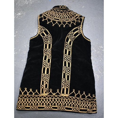 150 - A 19TH CENTURY MIDDLE EASTERN TURKISH OTTOMAN SILK JACKET. 46 cm wide (armpit to armpit).