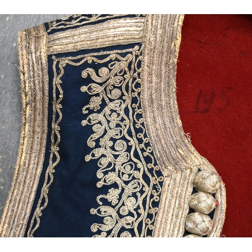 151 - THREE 19TH CENTURY MIDDLE EASTERN TURKISH OTTOMAN JACKETS. (3)  46 cm wide (armpit to armpit). (3)