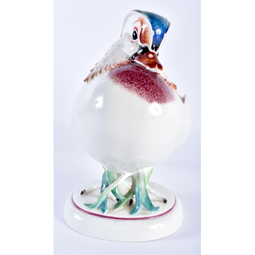 162 - AN UNUSUAL LARGE MEISSEN PORCELAIN FIGURE OF A BIRD modelled with brightly painted enamels, standing... 